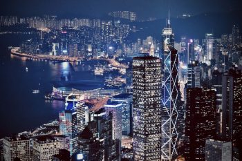 The Hong Kong skyline at night, illustrating architectural trends in Hong Kong.
