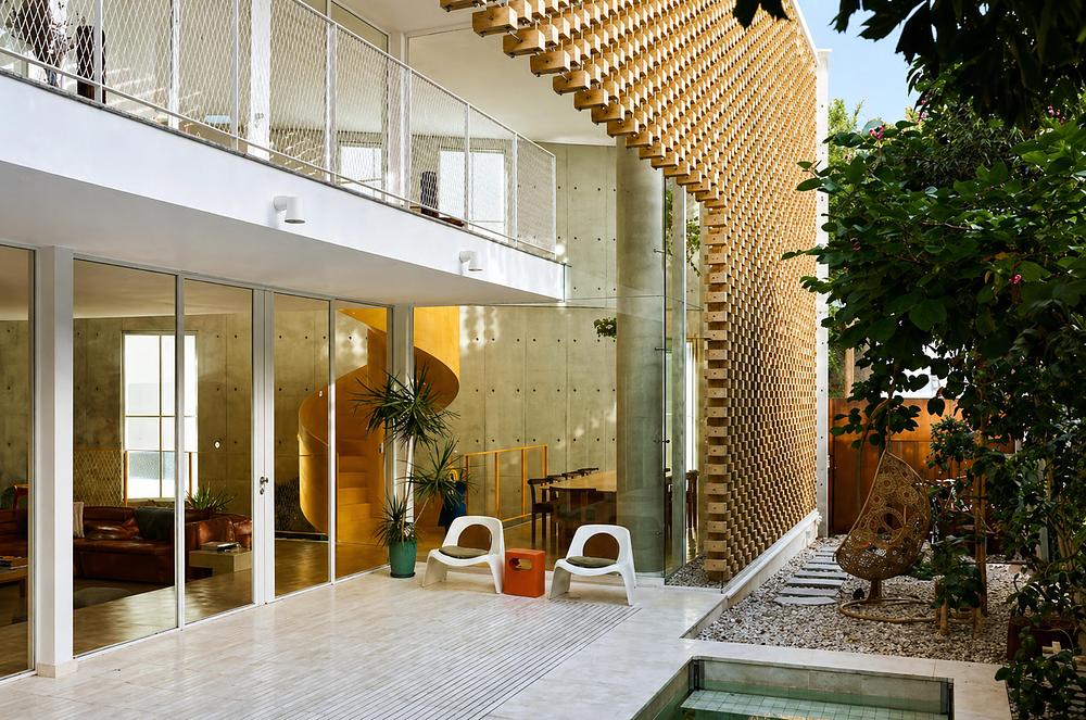 A Wooden Cube Facade Shaped by Light and Order