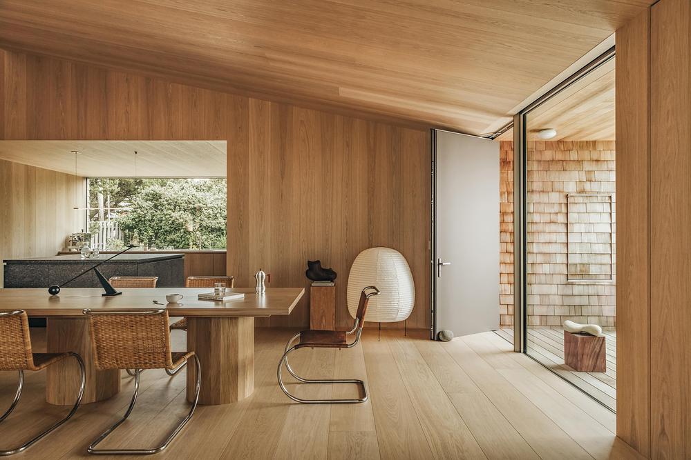 Cedar-Clad Dune House Centers on a Skylit Court