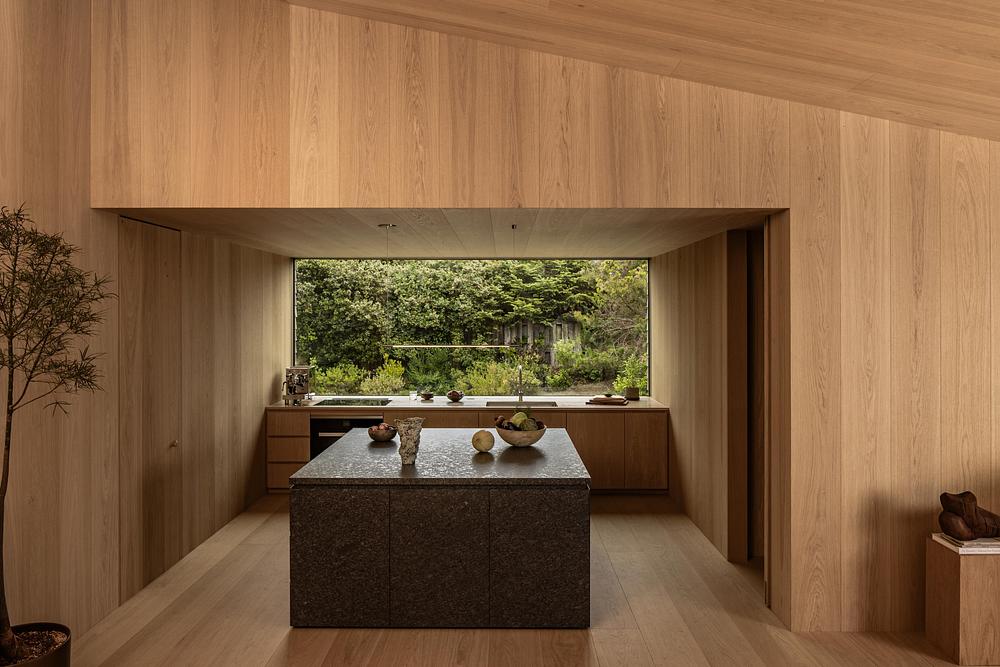 Cedar-Clad Dune House Centers on a Skylit Court