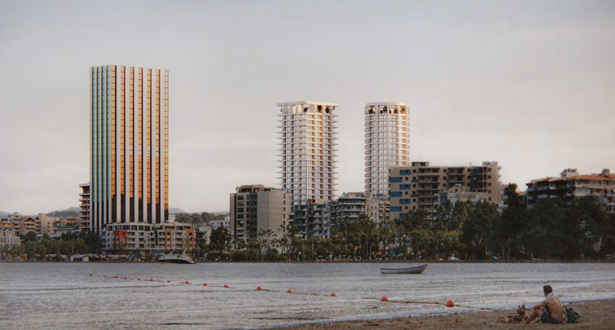 Duas Towers Rise Between Mountains and Sea