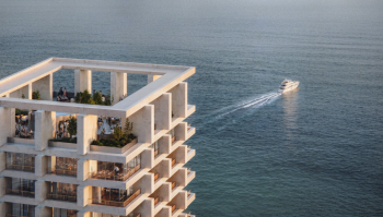 Duas Towers Rise Between Mountains and Sea