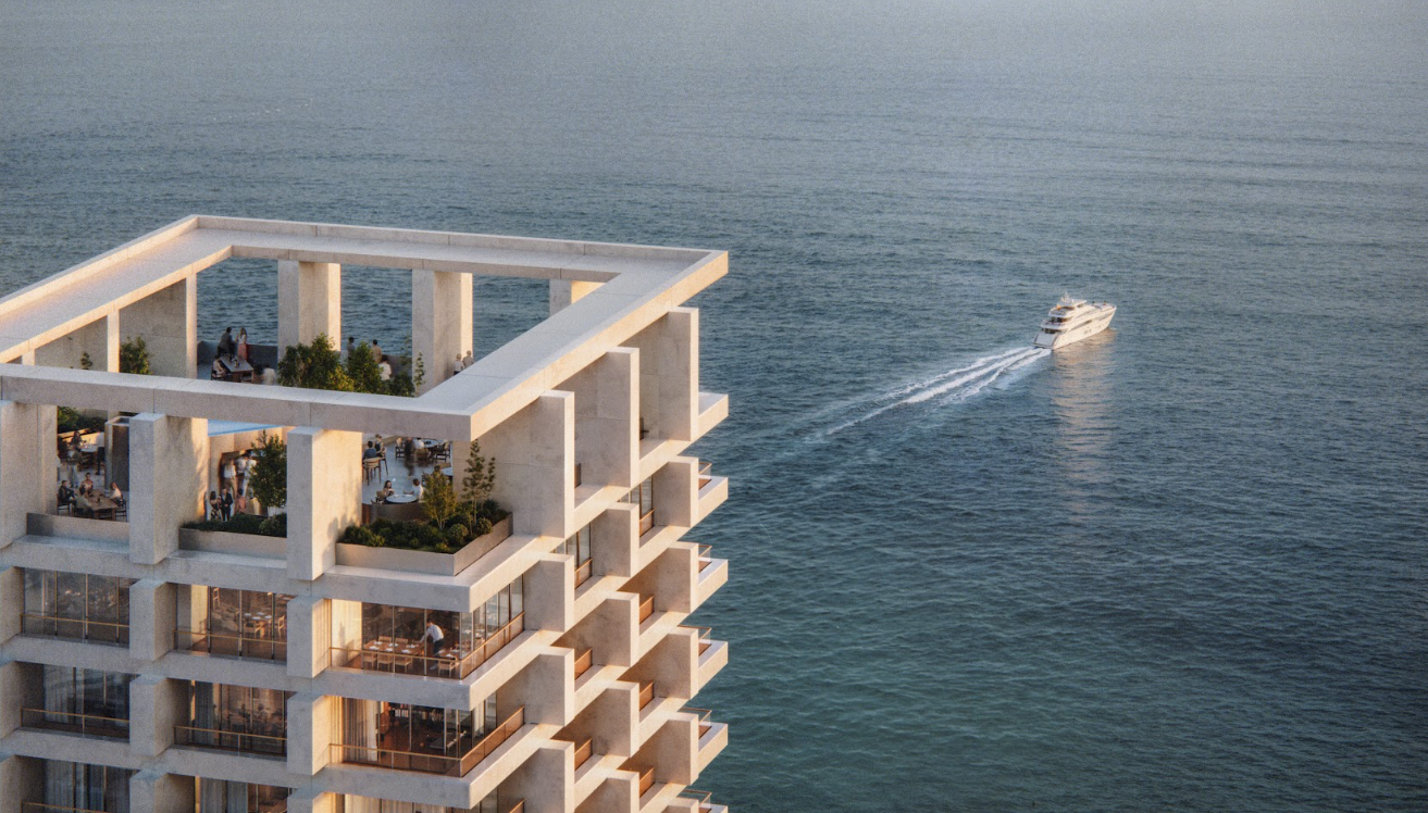 Duas Towers Rise Between Mountains and Sea