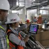 Construction team reviewing information together at a jobsite