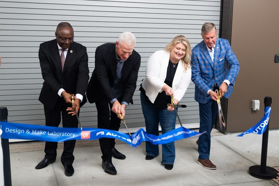 Four participants cut the ribbon at the Autodesk Design and Make Laboratory at the University of Florida